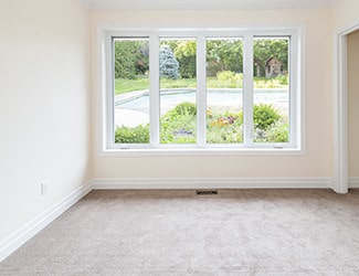 A spotless carpet in a cozy room 